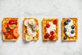 Traditional belgian waffles with whipped cream and fresh fruits Royalty Free Stock Photo