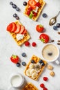 Traditional belgian waffles with whipped cream and fresh fruits Royalty Free Stock Photo