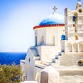 Traditional bells tower and blue dome of the orthodox white churches, Sifnos island, Greece