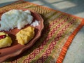 Traditional bengali home cooked thali or platter served on plate made of clay. boiled rice, lentil and potato. authentic indian Royalty Free Stock Photo