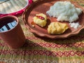 Traditional bengali home cooked thali or platter served on plate made of clay. boiled rice, lentil and potato. authentic indian Royalty Free Stock Photo