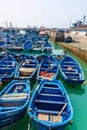 Traditional blue boats in the harbor of Essaouira, Morocco