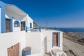 Traditional blue dome church and white bell tower in Santorini in Greece Royalty Free Stock Photo