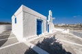 Traditional blue dome church and white bell tower in Santorini in Greece Royalty Free Stock Photo