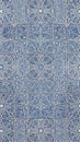 Traditional Blue and White Ceramic Tile Pattern Featuring Intricate Islamic Geometric and Floral Motifs in a Repeating Square Grid Royalty Free Stock Photo
