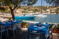 Traditional blue and white greek tavern with beautiful sea view on a summer sunny day in Kastos island, Lefkada Regional Royalty Free Stock Photo