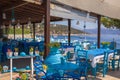 Traditional blue and white greek tavern with magnificent sea view in summer, Kastos island, Greece. Royalty Free Stock Photo