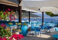 Traditional blue and white greek tavern with magnificent sea view on a summer sunny day in Kastos island, Lefkada Royalty Free Stock Photo