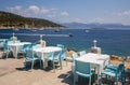 Traditional blue and white greek tavern with magnificent sea view on a summer sunny day in Kastos island, Lefkada Royalty Free Stock Photo