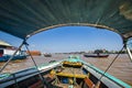 Traditional boat in the middle of Musi River, Palembang, Indonesia. Royalty Free Stock Photo