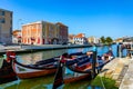 Traditional boats on the canal in Aveiro, Portugal. Colorful Moliceiro boat rides in Aveiro are popular with tourists to enjoy Royalty Free Stock Photo