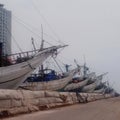 Traditional boats are leaning back to wait for cargo at the port sunda kelapa jakarta