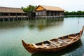 Traditional boats are leaning on a quiet dock. It`s boardwalk type dock Royalty Free Stock Photo