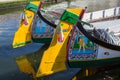 Traditional boats moliceiro on main city canal. Royalty Free Stock Photo