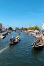 Traditional boats or moliceiros in Aveiro, vertical image Royalty Free Stock Photo