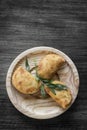 Traditional brazilian beef rissole fried tapas snack on wood plate Royalty Free Stock Photo