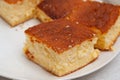 Traditional Brazilian dessert known as BOLO GELADO in Portuguese - Making step by step: Close-up of cake pieces Royalty Free Stock Photo