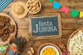 Traditional Brazilian food for summer Brazilian harvest festival. Festa Junina greeting card. Flat lay, top view