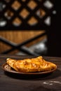 Traditional bread pita or khachapuri on the table with herbs. Homemade baking recipe Royalty Free Stock Photo