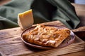 Traditional bread pita or khachapuri on the table with herbs. Homemade baking recipe Royalty Free Stock Photo