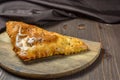 Traditional bread pita or khachapuri on the table with herbs. Homemade baking recipe Royalty Free Stock Photo