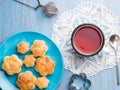 Traditional breakfast with a cup of tea and sweet pastries. A pl