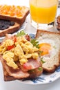 Traditional breakfast with juice, eggs and bacon Royalty Free Stock Photo