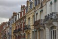 Traditional Brick built French Terraced Seaside Property with their Colours weathered by the elements Royalty Free Stock Photo