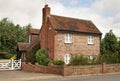 Traditional Brick and Flint English Cottage Royalty Free Stock Photo