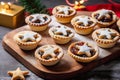 Traditional British Christmas Pastry Home Baked Mince Pies with Apple Raisins Nuts Filling on rustic wood table