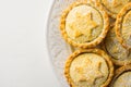 Traditional British Christmas Pastry Home Baked Mince Pies with Apple Raisins Nuts Filling on Vintage Plate White Kitchen Table Royalty Free Stock Photo