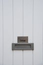 Traditional british cottage white door with mail box. Royalty Free Stock Photo