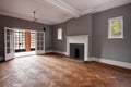 Traditional British living room with substantial fireplace Royalty Free Stock Photo