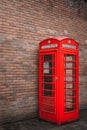 The traditional British public red telephone kiosk or booth Royalty Free Stock Photo