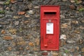 Traditional British red post box Royalty Free Stock Photo
