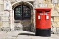 Traditional British Red Post Box, by York City Wall. York, UK. May 25, 2023. Royalty Free Stock Photo