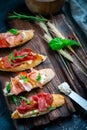 Traditional Bruschetta set with Parma dried ham Royalty Free Stock Photo