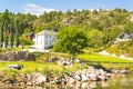 Traditional buildings of Norwegian, Norwegian village on the fjord coast. Royalty Free Stock Photo