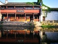 Traditional buildings reflecting on peaceful river Royalty Free Stock Photo