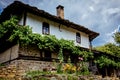 Large rural village house in Bulgaria with flowered terraced wall Royalty Free Stock Photo