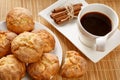 Traditional bulgarian cookies, called kurabiiki, cup of coffee and tied cinnamon sticks. Warm and delicious autumn breakfast