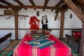 Smilen, Bulgaria - Indoor interior of old bulgarian house, ethnography, traditional costumes from Bulgaria, hanged on a wall