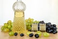 Traditional bulgarian home made brandy tape fruit drink, called grozdova grape rakia, in crystal bottle and two glasses on a woo Royalty Free Stock Photo