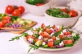 Traditional Bulgarian salad Shopski with fresh vegetables and fe