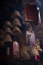 Traditional burning incense coils inside chinese a-ma temple in macau