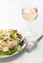 Traditional Caesar Salad with Wine Royalty Free Stock Photo