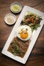 Traditional cambodian Lok Lak stir fried beef with rice meal Royalty Free Stock Photo