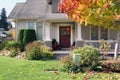 Traditional Canadian house with a large front yard.