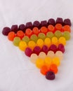 Triangle of colourful jelly Midget Gems. Traditional candy -British corner shop favorite.