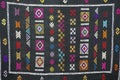 Traditional carpet pattern of Black Miao Hmong minority cloth, Sapa, Vietnam.